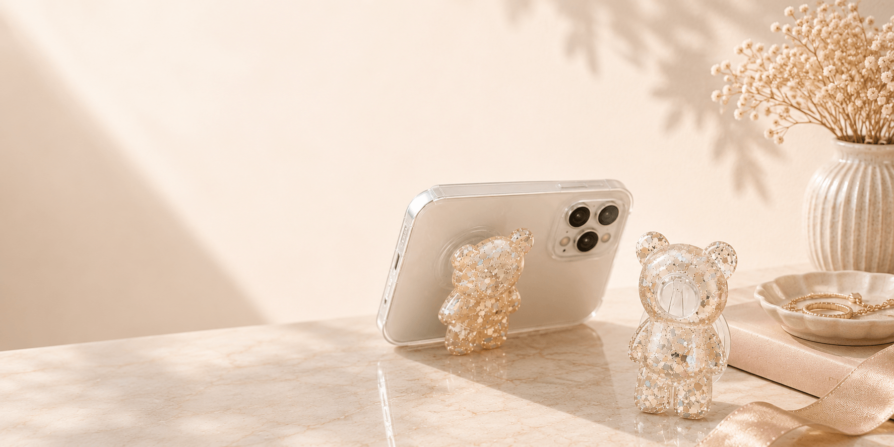 Pop Socket y grips W.todocell en estilo editorial.